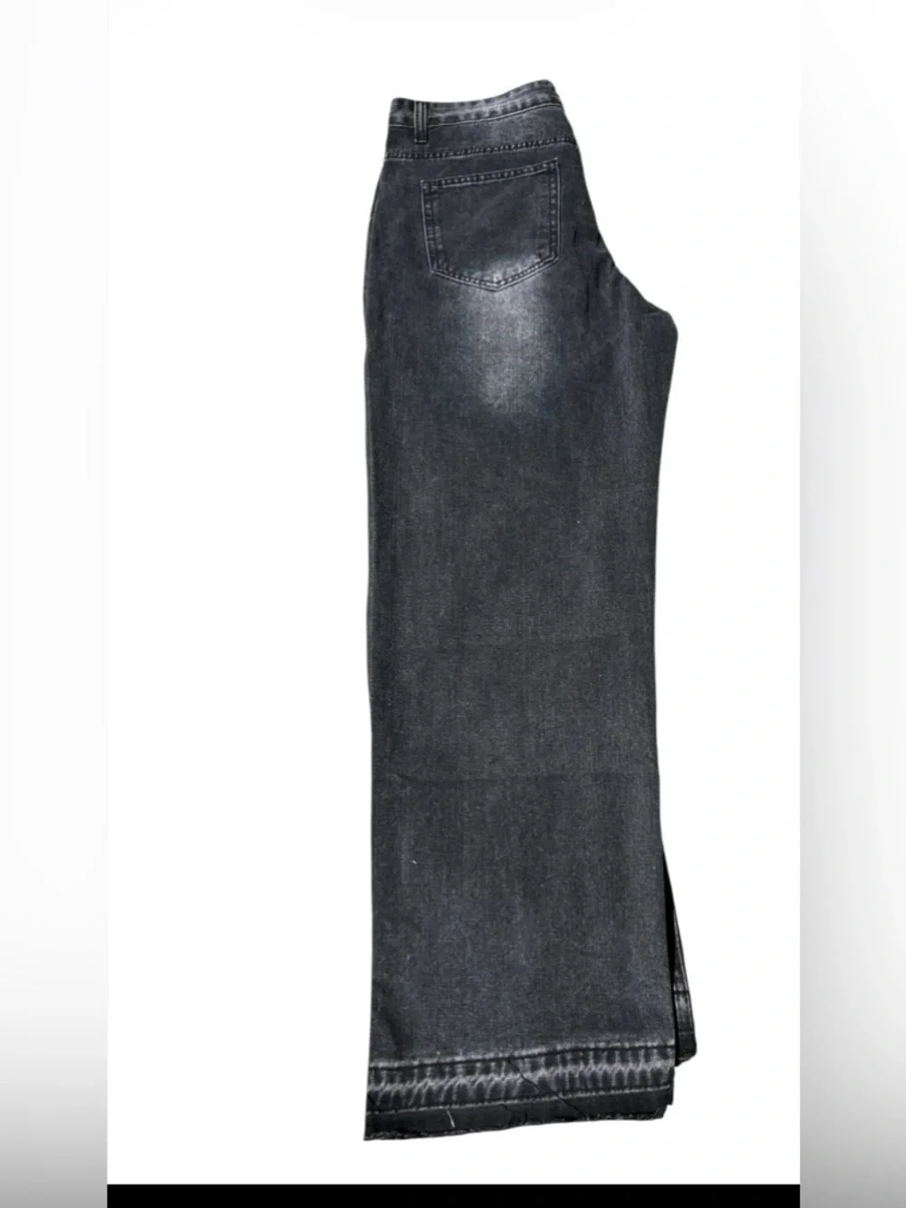 Relaxed Black Washed Jeans with Subtle White Paint Detail